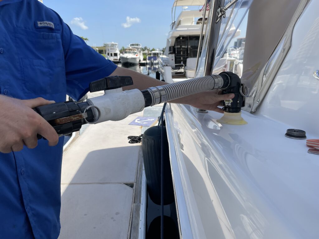 Person using boat discharge pumpout.